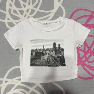 Garage White Graphic Stormi Tee